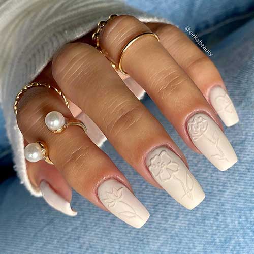 Classy matte coffin white flower nails to celebrate Mother's Day in 2023