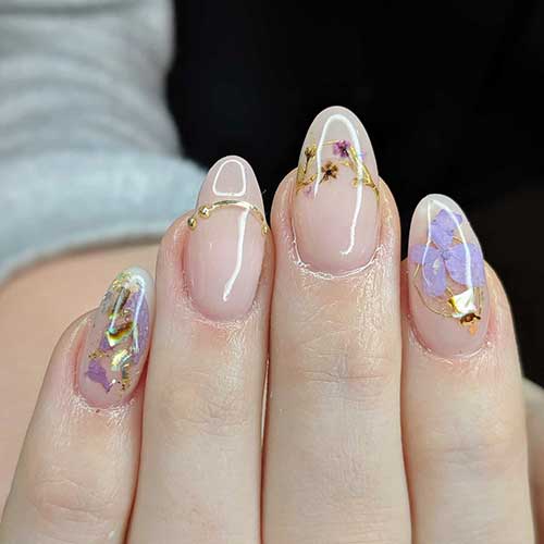 Medium Almond Shaped Pressed Flower Nails over Nude Base Color