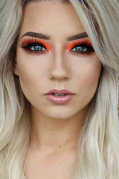 Neon orange eye makeup is one of the best eyeshadow colors for summer