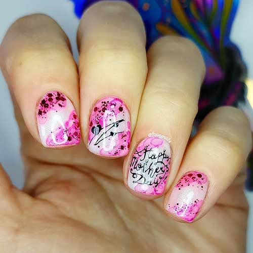 Short Pink, white, and black Mother's Day nails with abstract nail art