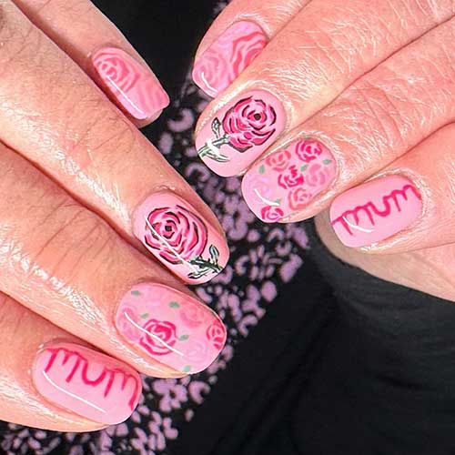 Short Pink Mother's Day Nails with Flowers and A MUM Word on An Accent Nail
