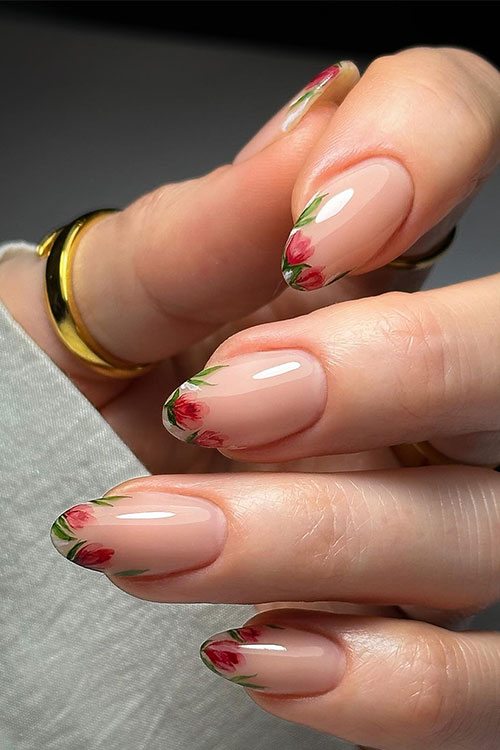 Cute floral French tip nails almond shaped