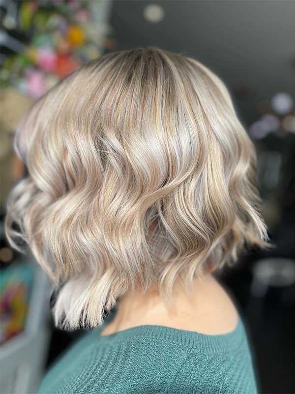 Gorgeous short creamy blonde hair styled using Moroccanoil Dry Texture Spray