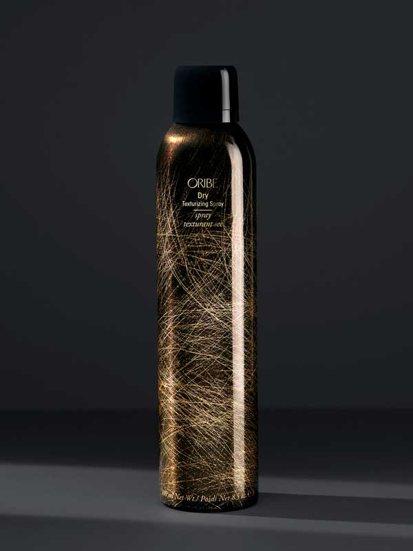 Oribe Dry Texturizing Spray is designed to add texture, volume, and hold to hair without leaving any visible residue
