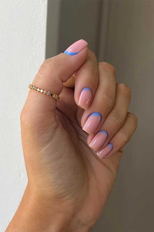 Blue reverse French summer short nails with nude base color shade