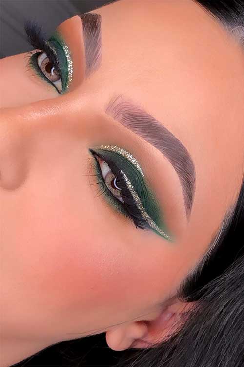 Green eye makeup with black and gold glitter eyeliners