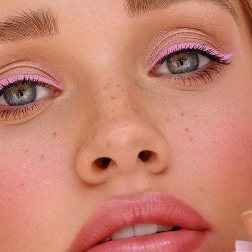 Pink eyeliner is a fun and playful colored eyeliner style that adds a pop of color to your eyes