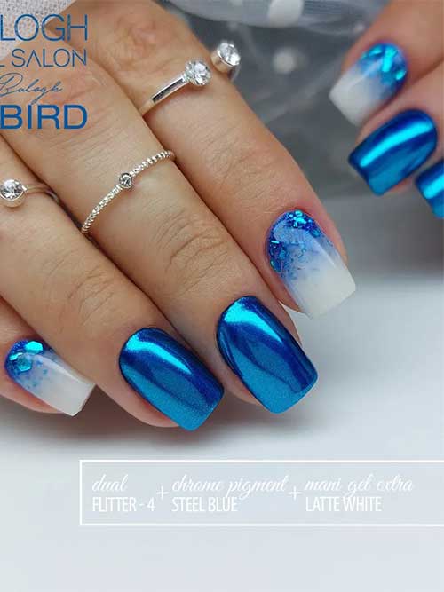 Short square shaped blue chrome nails with two accent white blue ombre nails adorned with glitter
