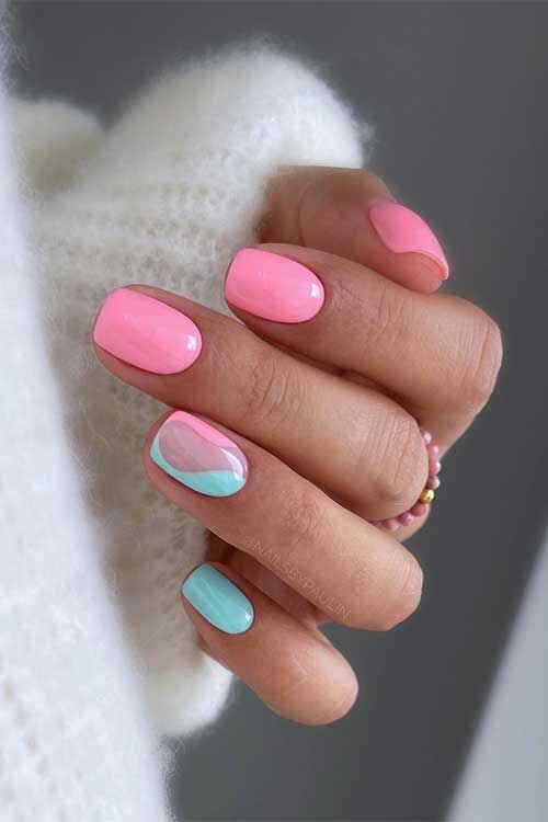 Summer short light blue and pink nails with a negative space on an accent nail