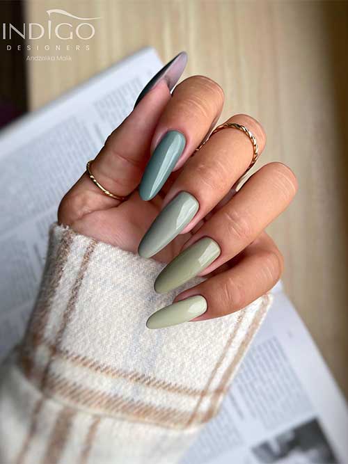 Long almond-shaped Soft green nails in different shades are perfect fall nails in 2023