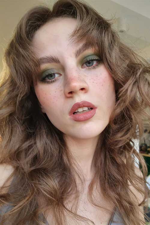 Matte Light green makeup look with matte Cranberry lips