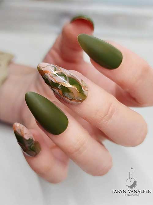 Medium almond-shaped dark olive green nails enhanced with abstract nail art and luxurious gold touches