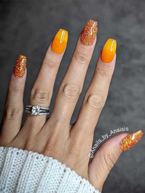 Short Coffin yellow orange pumpkin nails and sparkling pumpkin spice metallic glitter accent nails