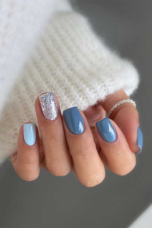 Short dusty blue September nails and delicate light blue and silver glitter accent nails