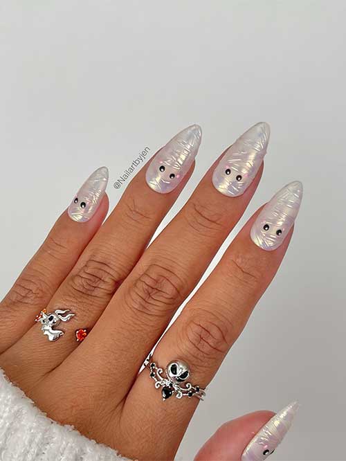 Almond-shaped Halloween mummy nails adorned with glazed 3D gel for a festive and spooky look.