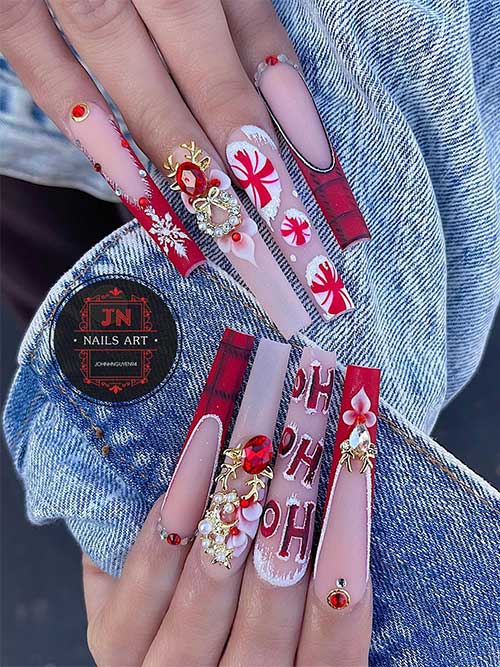 Long red French Christmas Nails with plaid nail art, snowflakes, rhinestones, and two accent nails adorned with gift ties