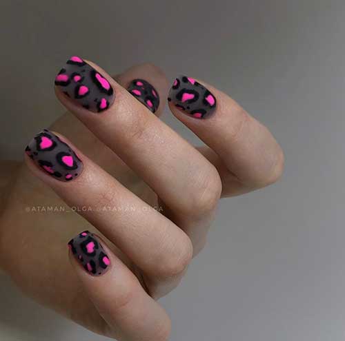 Chic matte shear short black nails with bold black and hot pink leopard prints