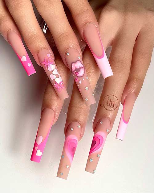 Long coffin matte light and hot pink French Valentine’s Day nails with two nude accent nails adorned with heart shapes