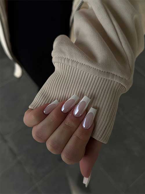 Long coffin-shaped white French tip nails with a glazed white chrome effect