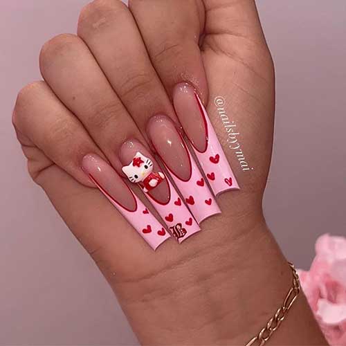 Long square-shaped pink French Valentine’s Day nails adorned with tiny red hearts and a red outline under each pink nail tip