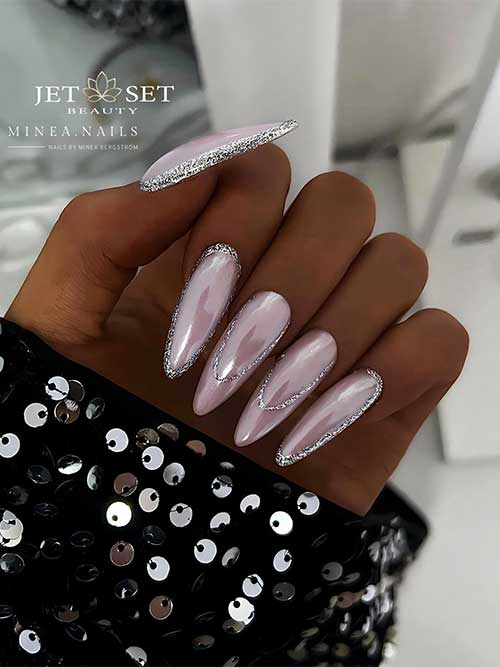 Sparkly long almond-shaped nude pink festive French manicure with silver glitter French tips and white ice chrome effect