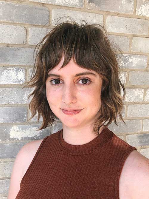 Textured balayage brunette short shag haircut is one of the cutest short shag haircuts