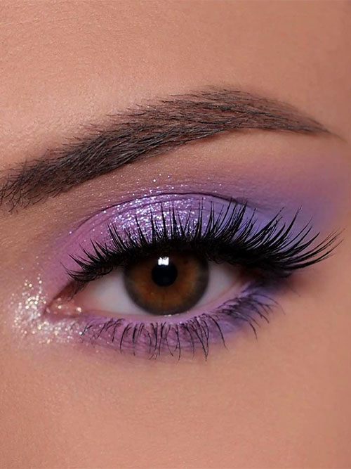 Matte pink and purple eye makeup with a touch of glitter on the inner corners and the upper eyelid