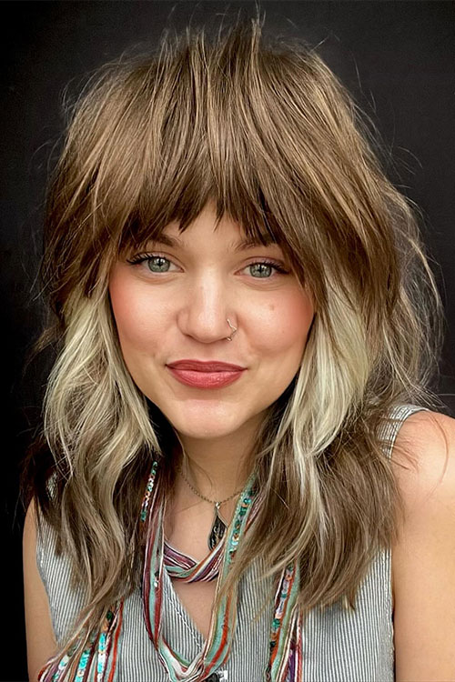 Messy texture face framing shag with bangs for thick hair women