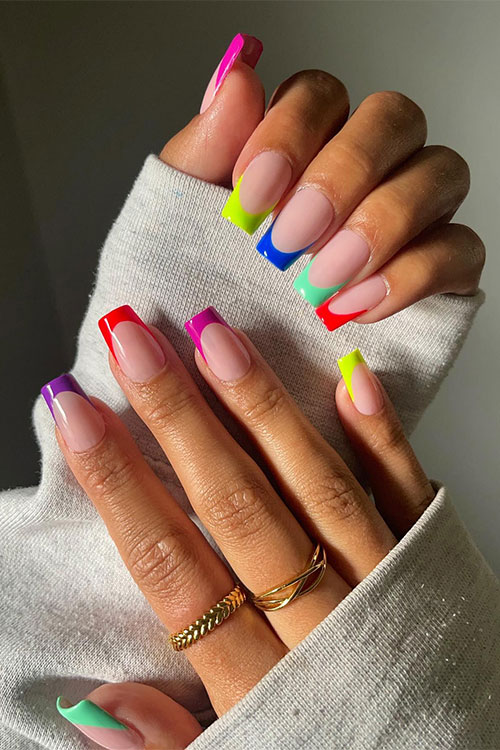 Glossy coffin-shaped French neon multicolored nails for the summer season