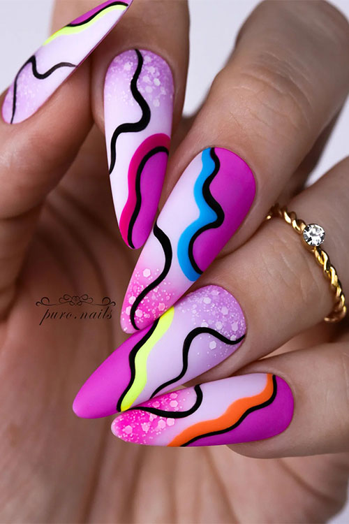 Long almond-shaped matte multicolored neon nails adorned with glitter, swirls, ombre style, and negative space nail art