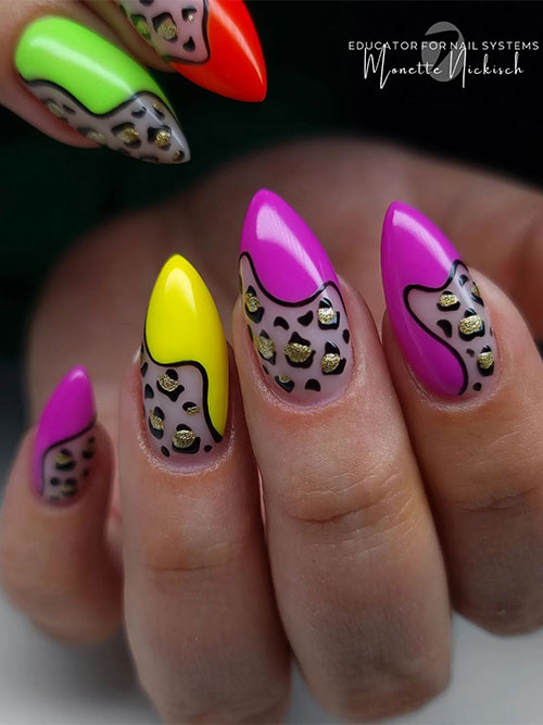 Long almond-shaped multicolored neon French tip nails with a twist and leopard prints adorned with a touch of gold glitter