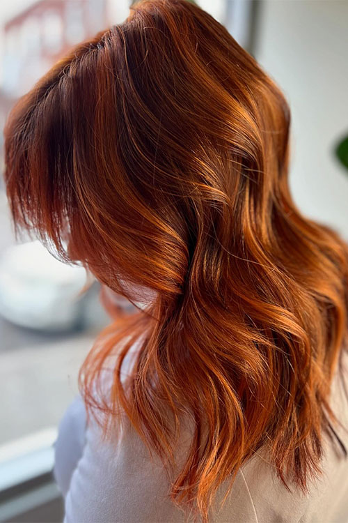 Long wavy ginger hair color