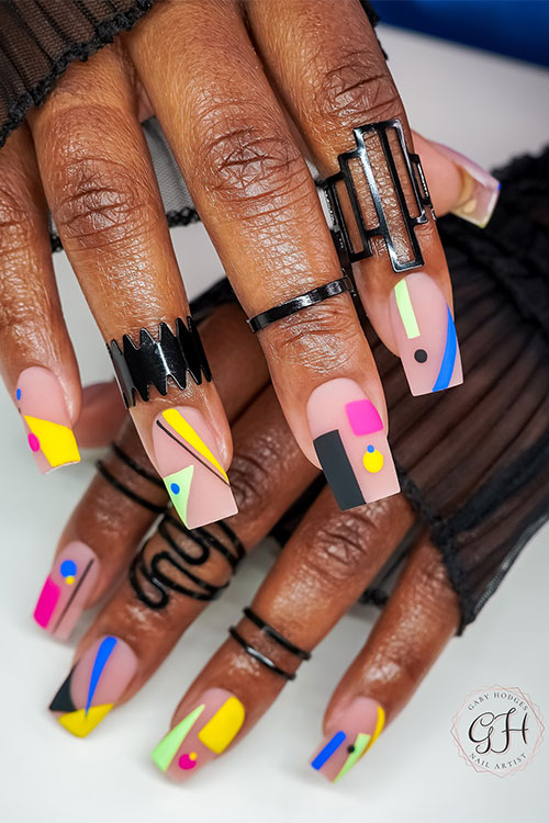 Matte long square-shaped multicolored neon nails feature geometric nail art designs