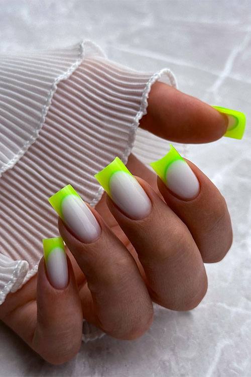 Neon green French tip nails square long length over milky white base color