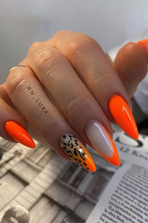 orange neon nails long almond-shaped with a French accent nail and another ombre orange neon nails with leopard prints