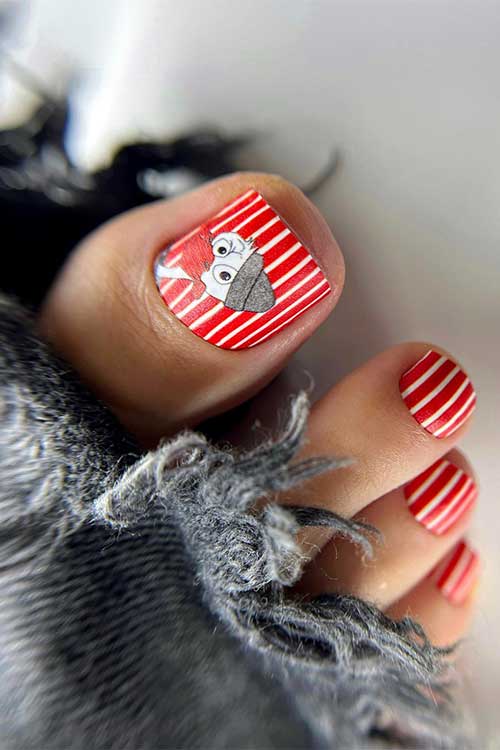 The cute red pedicure idea with white stripes is one of the best pedicure ideas to try