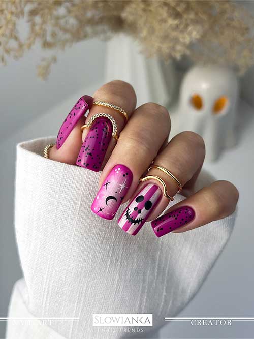 Magenta cute Halloween nails feature black dot nail art, celestial nail art, and a scary face on a striped accent nail.