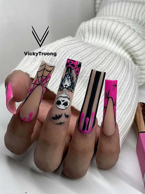 Pink and black French Halloween nails feature spider webs, stitch nail art, and a nude accent nail decorated with scarecrow