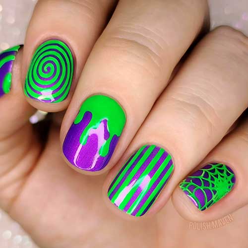 Short green and purple Beetlejuice Halloween nails.