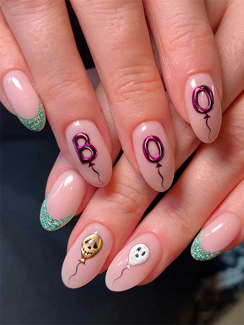 Simple nude Halloween nails feature vampy 3d gel “BOO” letters as ballons and green glitter French accents