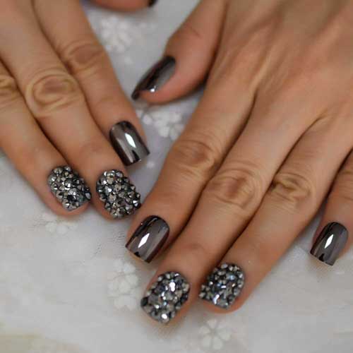 Dark smoky gray metallic false nails with reflective mirror finish and punk diamond design, includes glue stickers.