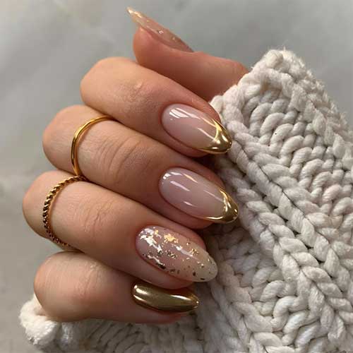 Glossy gold French tip press-on nails in medium almond shape, featuring glitter and full coverage, ideal for manicures. 24 pieces.