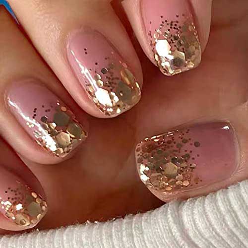 Short pink acrylic press-on nails with clear square design and sequins for a stylish and elegant look.