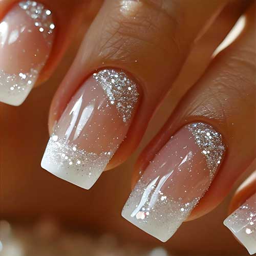 Short square fake nails featuring white French tips and glossy bling, 24 pieces of medium squoval artificial nails for women.