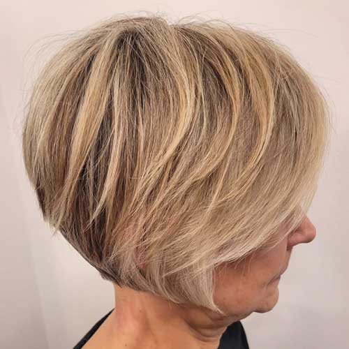 A stylish graduated bob haircut for women over 50, featuring soft layers and a sophisticated, modern look.