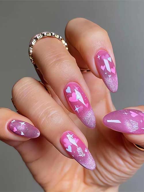 Cute pink acrylic press-on nails featuring a glossy finish and charming heart and star designs for Valentine's Day.