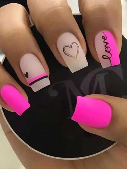 Pink square press-on nails with glossy finish, featuring black love designs, perfect for Valentine's Day nail art.