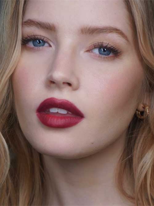 Stunning berry lips are one of the cool winter makeup trends perfect for the cold season's beauty trends.