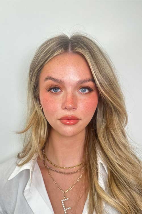 Bright tomato-inspired makeup look featuring vibrant red hues perfect for spring makeup looks