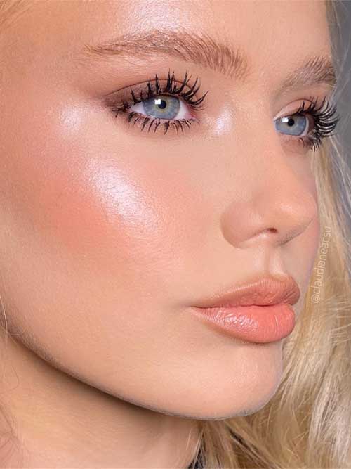 Soft, peachy lips embody the essence of spring makeup trends, adding a fresh and vibrant touch to any look.